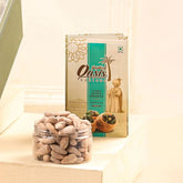 Luxury Arabian sweets pack and a jar of coated almonds from the Handpicked Flavour Box | Gift Hampers Online, ideal for festive gifting.